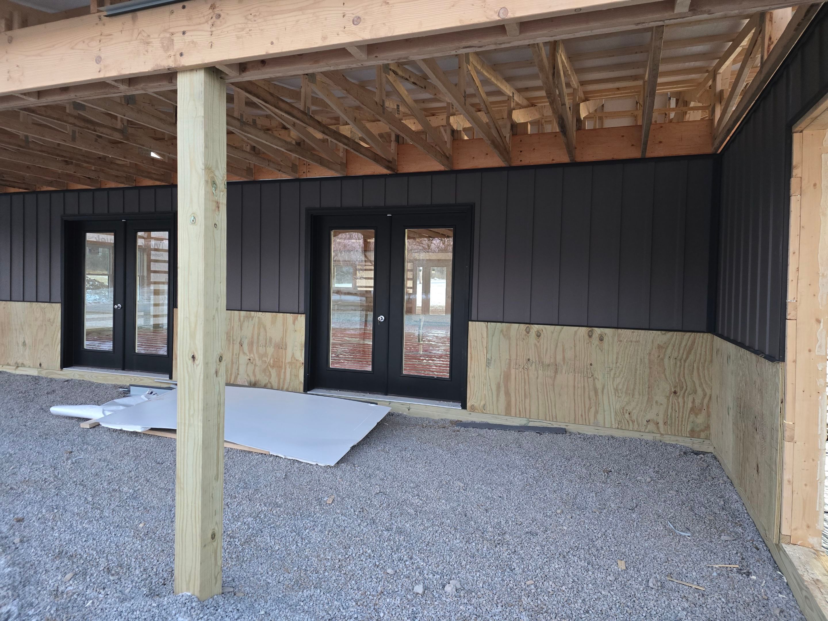 Barndominium  using Textured Board & Batton by Horst Custom Homes 