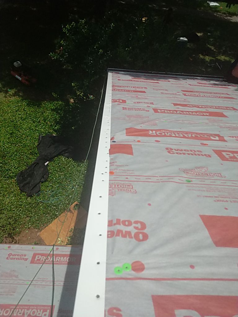 Residential Roofing Installation using Roof Replacement by American Roofing & Construction LLC