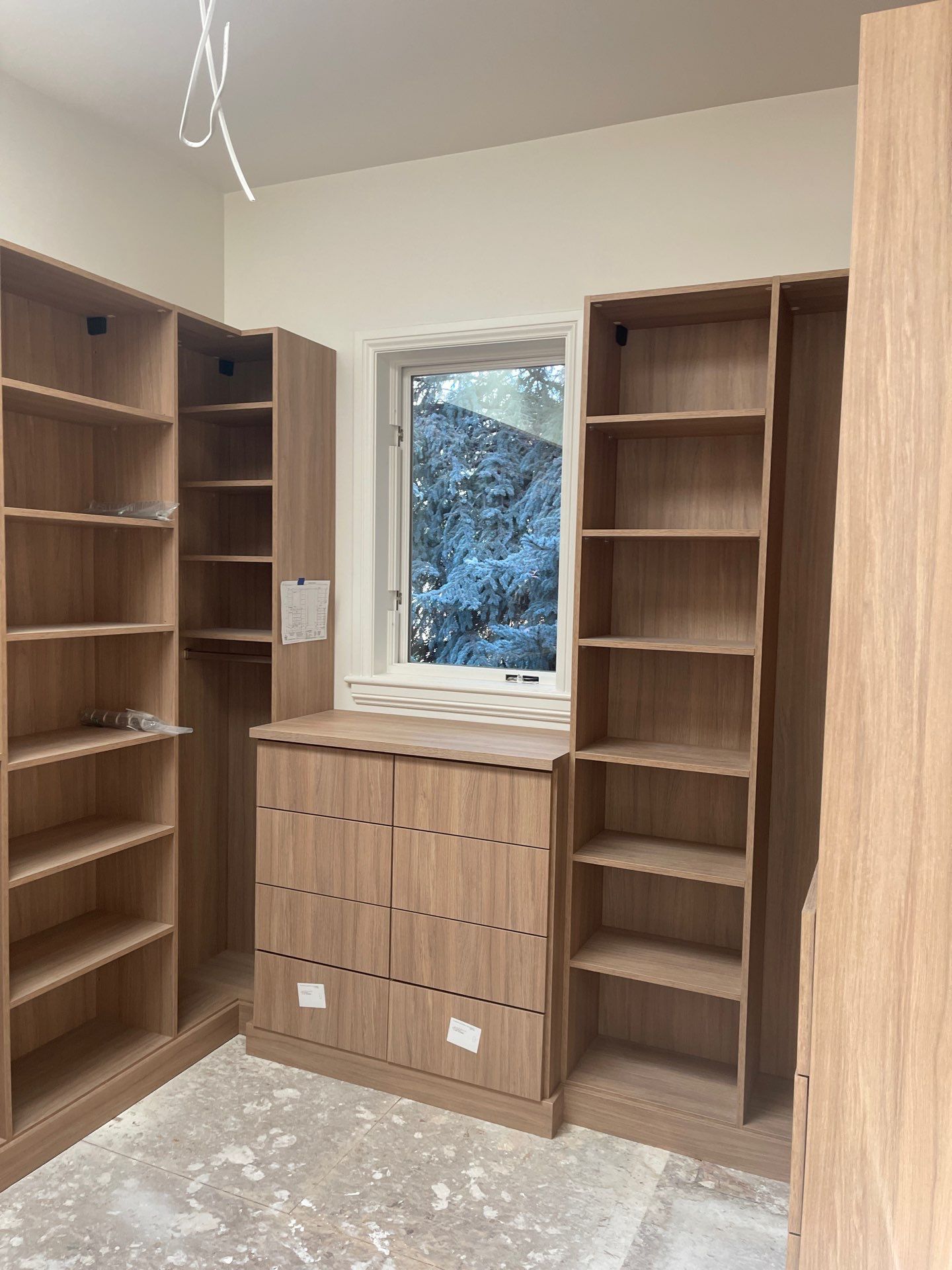Expansive Primary Closet in Cherry Hills Village by Concept 32, Inc.