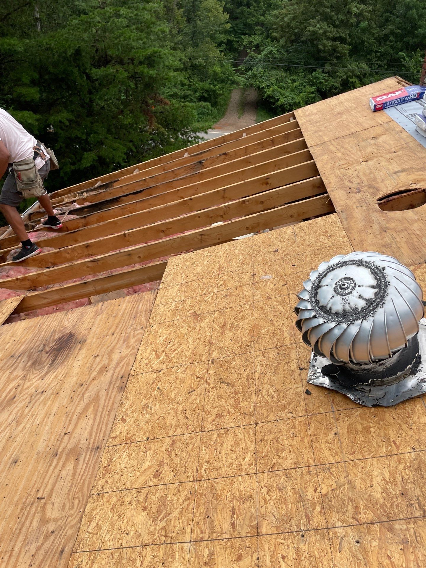 Residential Roofing Installation using GAF Timberline HDZ Charcoal by Rainstoppers Roofing