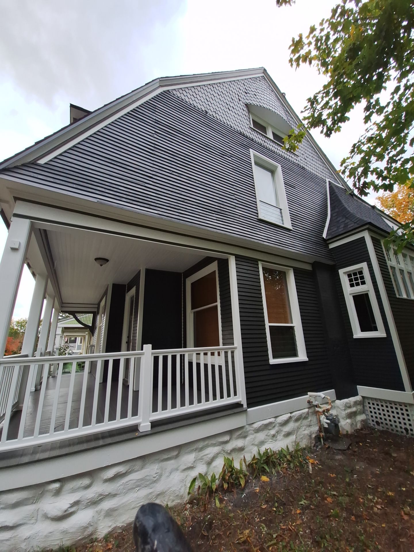 Exterior Home & Porch Refresh in Grand Haven, MI by Gordon Painting