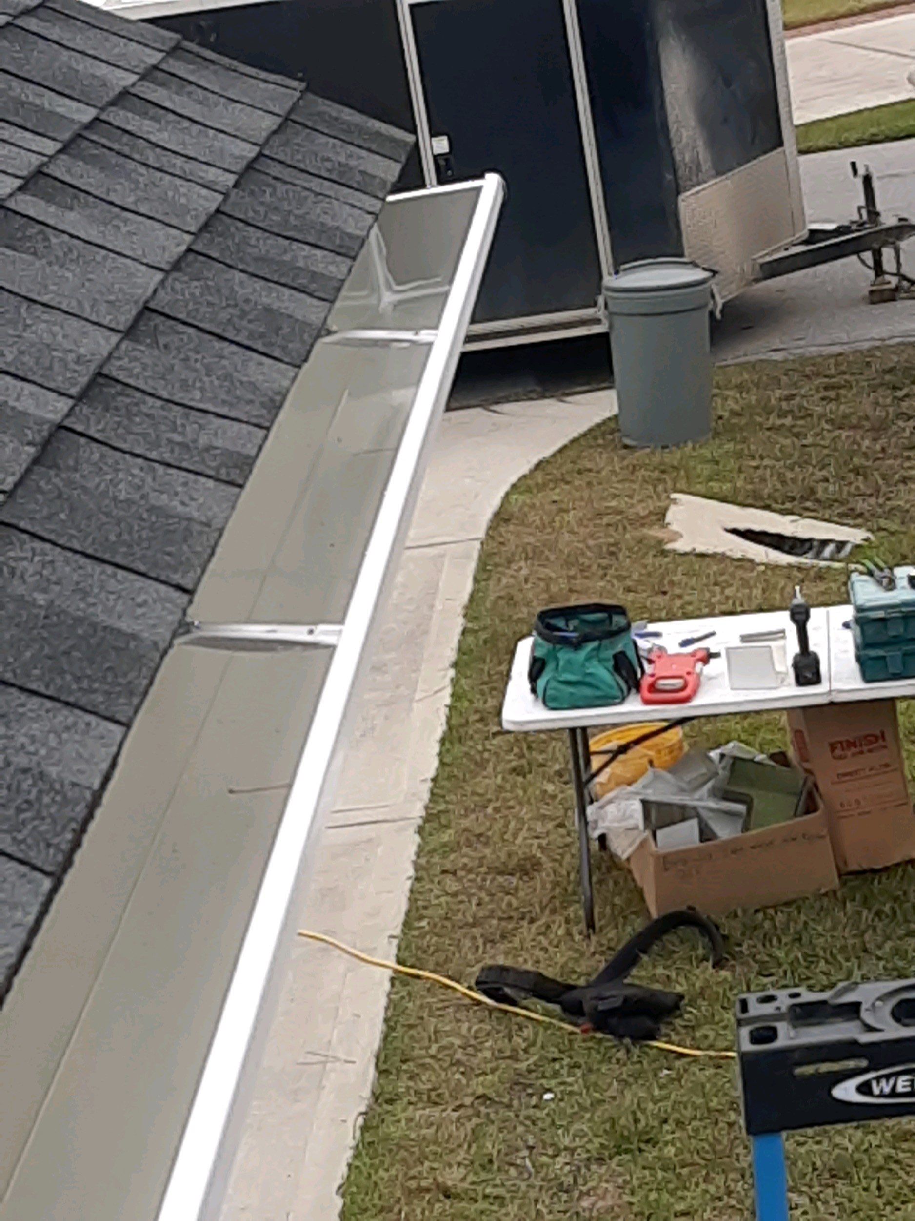 Gutter Installation using White K-Style Seamless Gutters by Gutter Professors