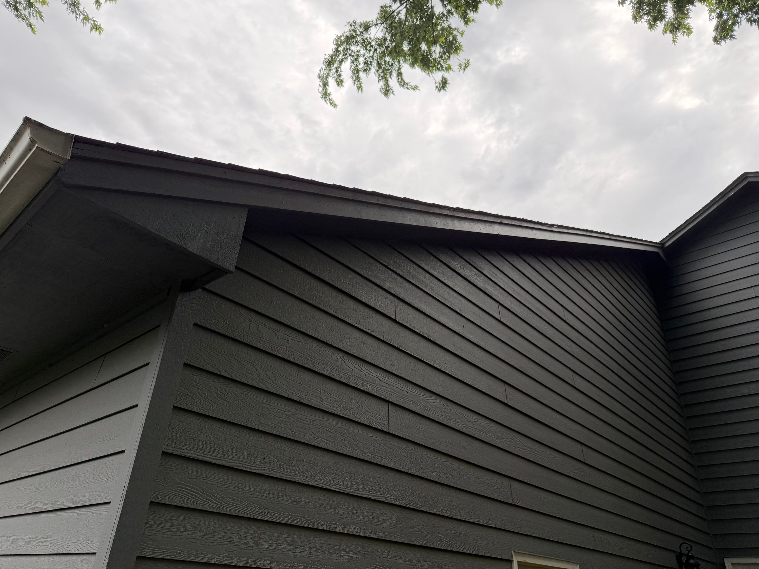 Full Exterior Painting for Gray Siding and Trim in Sioux Falls by Select Painting, Coatings & Garage Cabinets