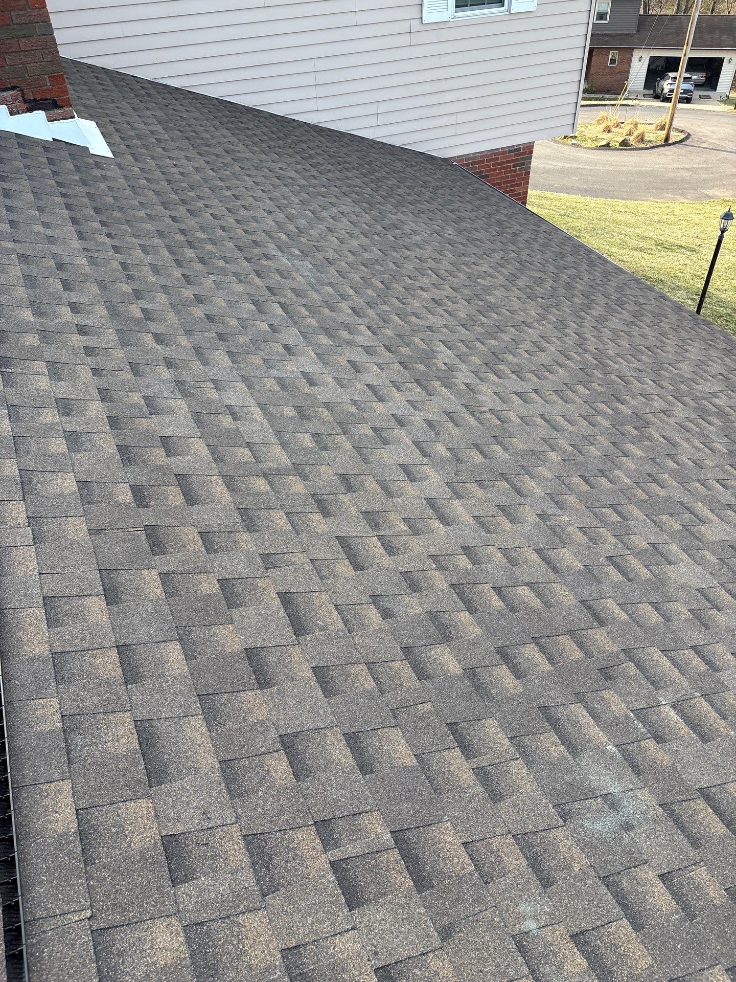Residential Roofing Installation using GAF Timberline HDZ Charcoal by Rainstoppers Roofing
