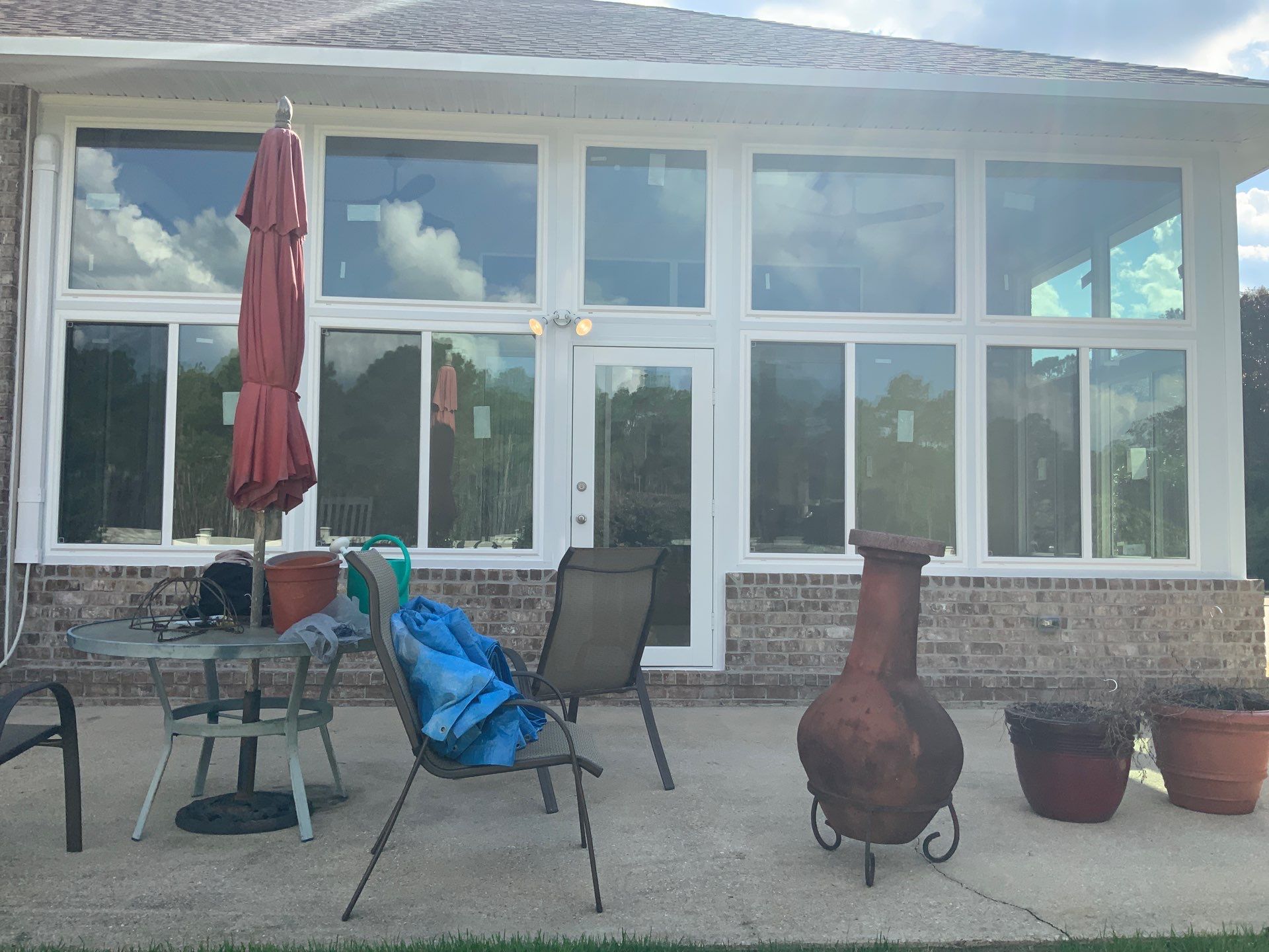 Screen Room Conversion to Glass Under  by Titan Sunrooms