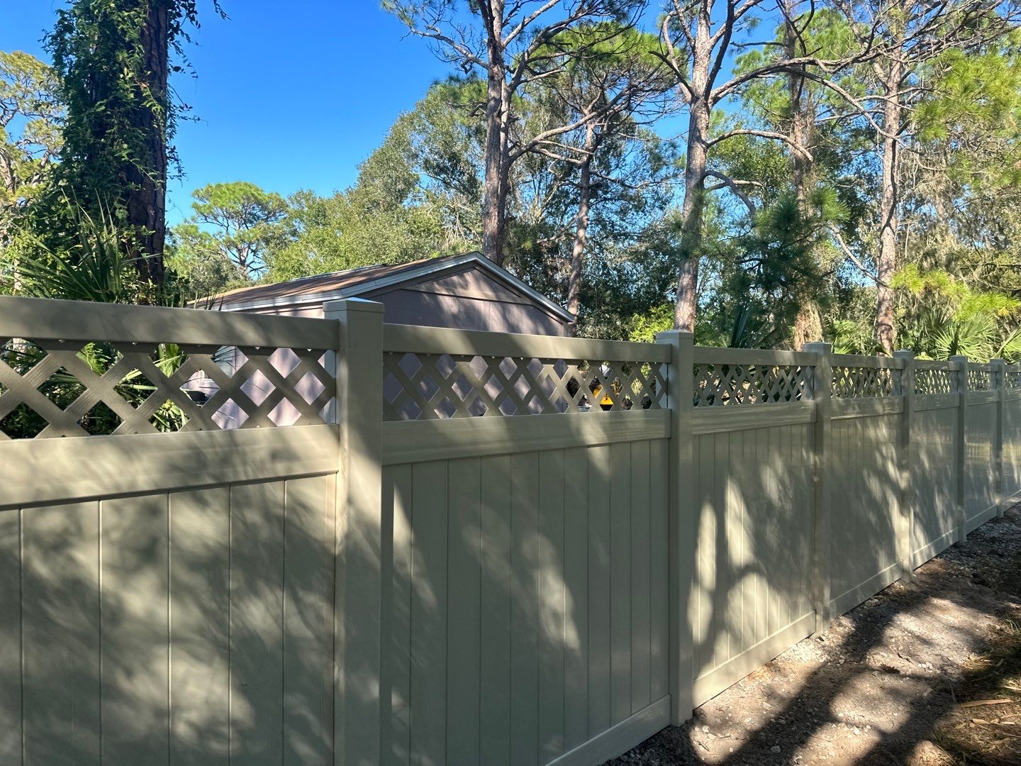 Vinyl Fence Installation using 6Ft Tan Vinyl Privacy Fence with Lattice Top by Asap fence and gates, LLC