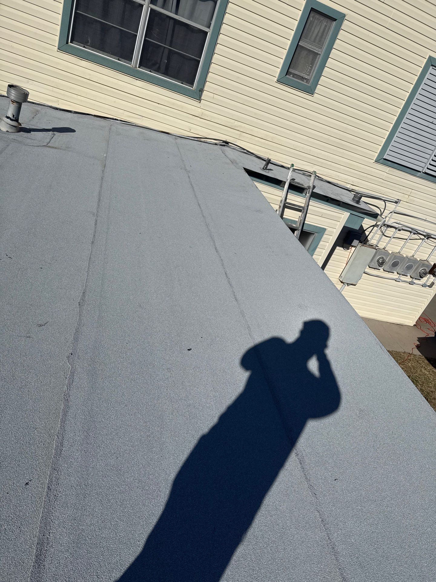 Mustang Island Flat Top by Bayfront Roofing and Construction