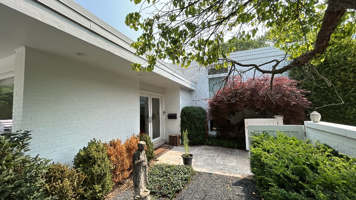 marble patio cleaning and sanding using Polysweep polymeric sand by Northern Power Washing LLC.