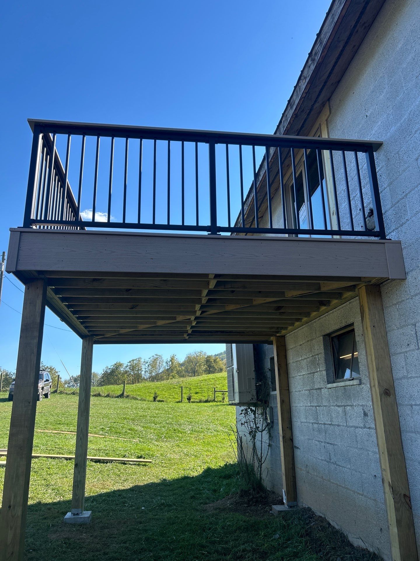 Elevated Composite Deck in Ronceverte by Walnut Hollow Decks & Outdoor Living