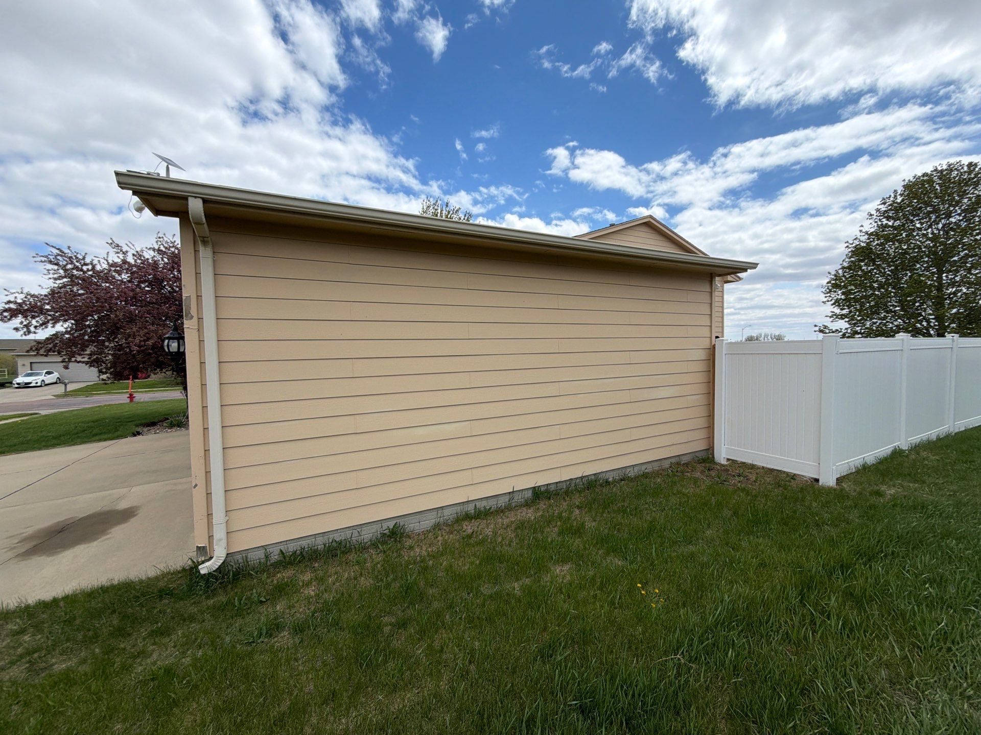 Exterior Painting and Siding Restoration for Harrisburg Residential Home by Select Painting, Coatings & Garage Cabinets