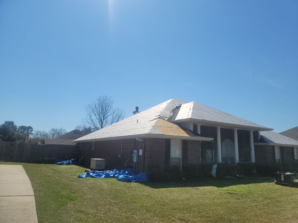 Residential Roofing Installation using Roof Replacement by American Roofing & Construction LLC