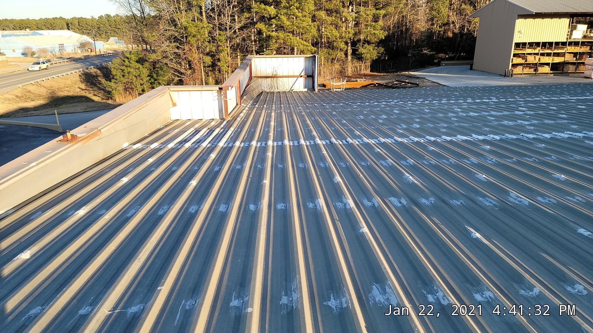 Commercial Roofing Installation using Aldocoat Coatings by Hostetler Roofing
