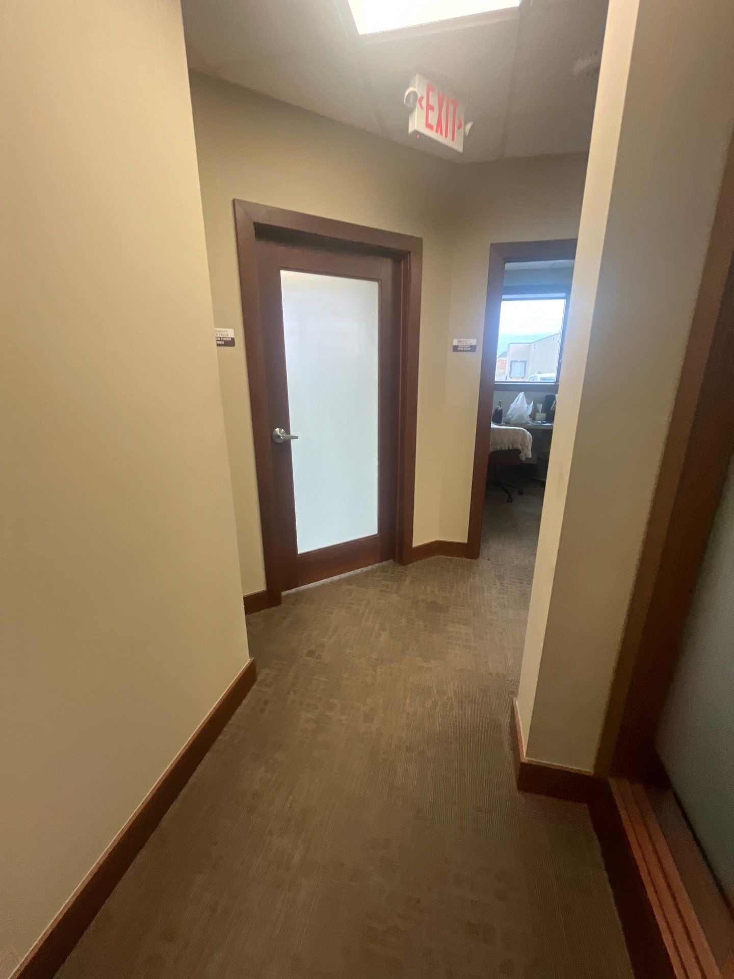 Commercial Office Interior Remodel and Modern Suite Refresh in Sioux Falls by Select Painting, Coatings & Garage Cabinets