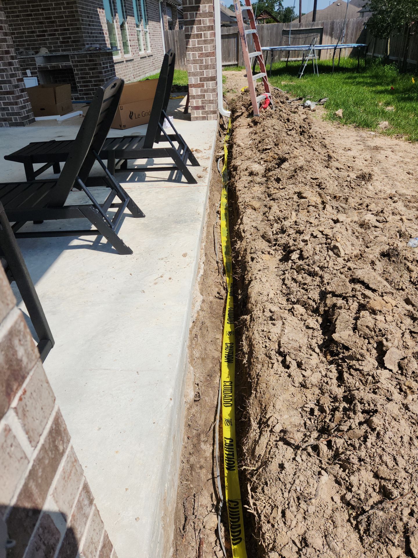 Covered patio and Summer Kitchen in Spring, TX by SophAlx LLC