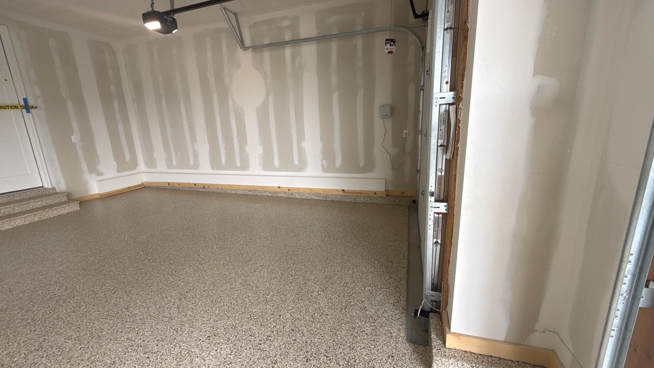 Mark Chose The Best Time To Do His Floor, Right Before Move In  by Banner Garage
