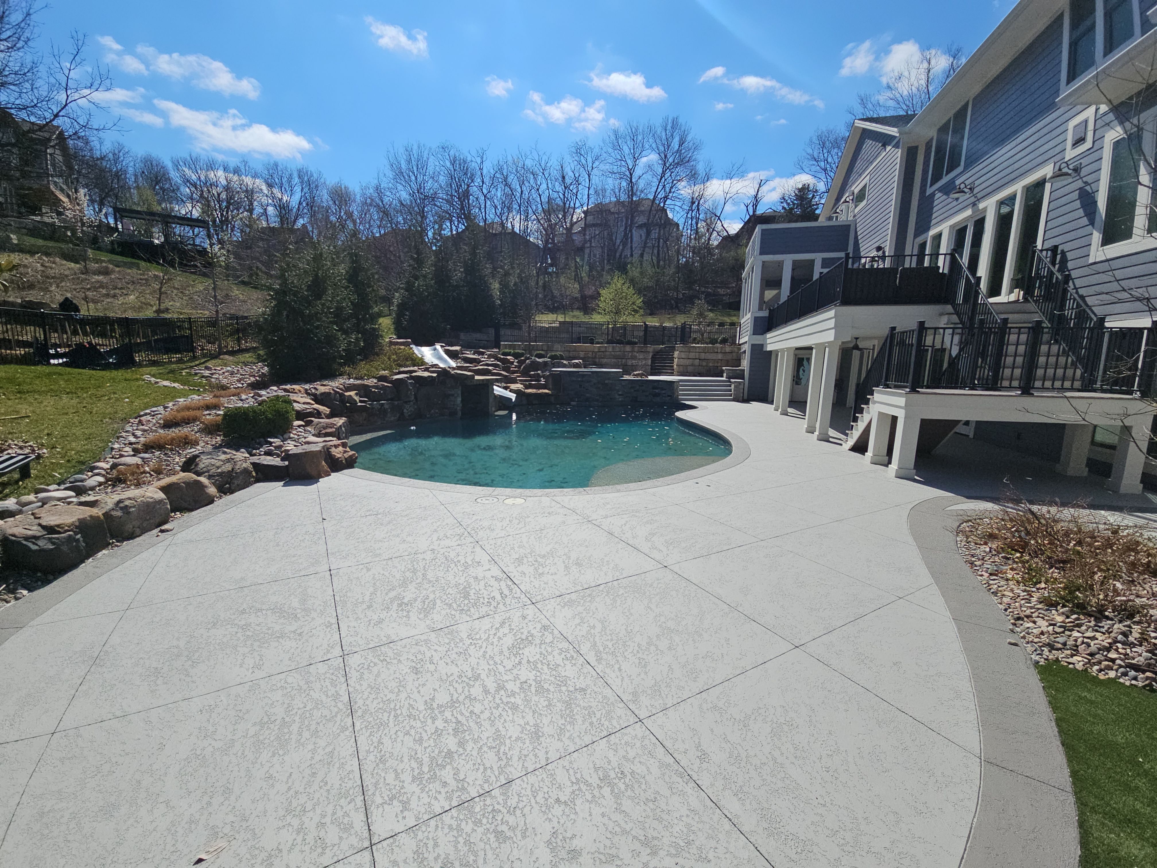 Stilwell, KS -- Pool Deck Resurfacing by Big Red Decorative Concrete, LLC