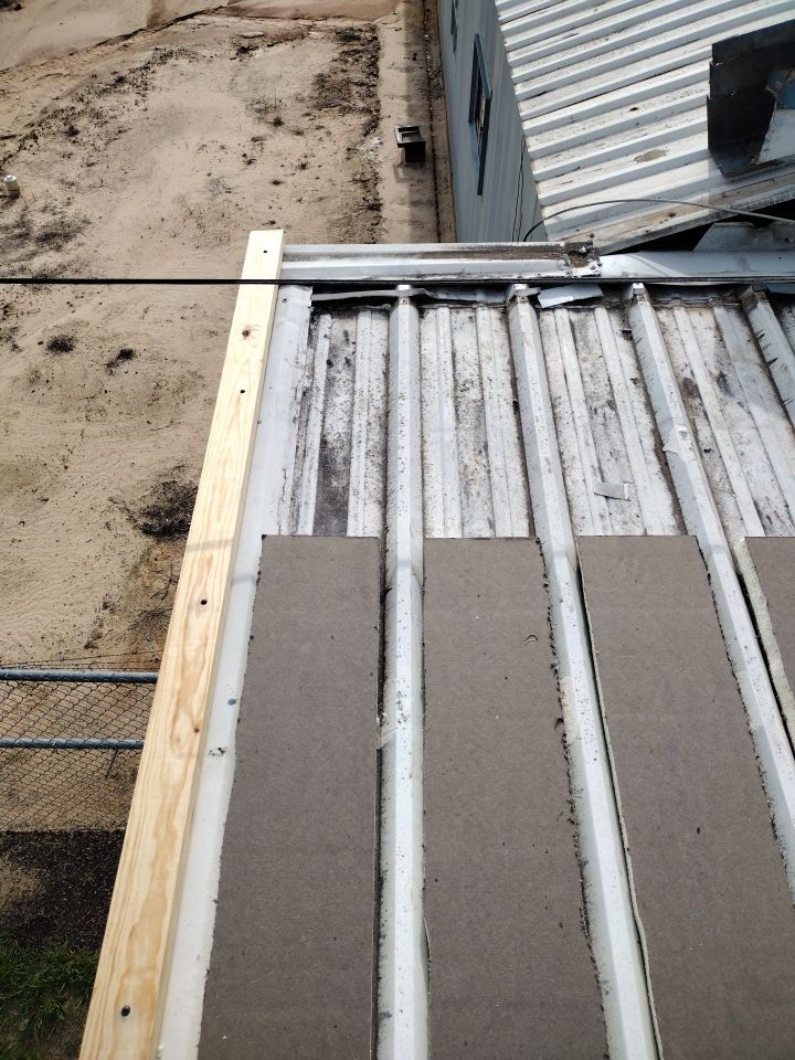 Office Building in Magnolia by Hostetler Roofing