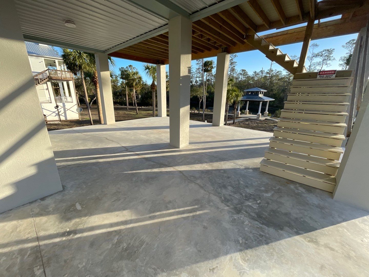 Under Side of Home in Hybrid Shale by Cross Creek Concrete Coatings