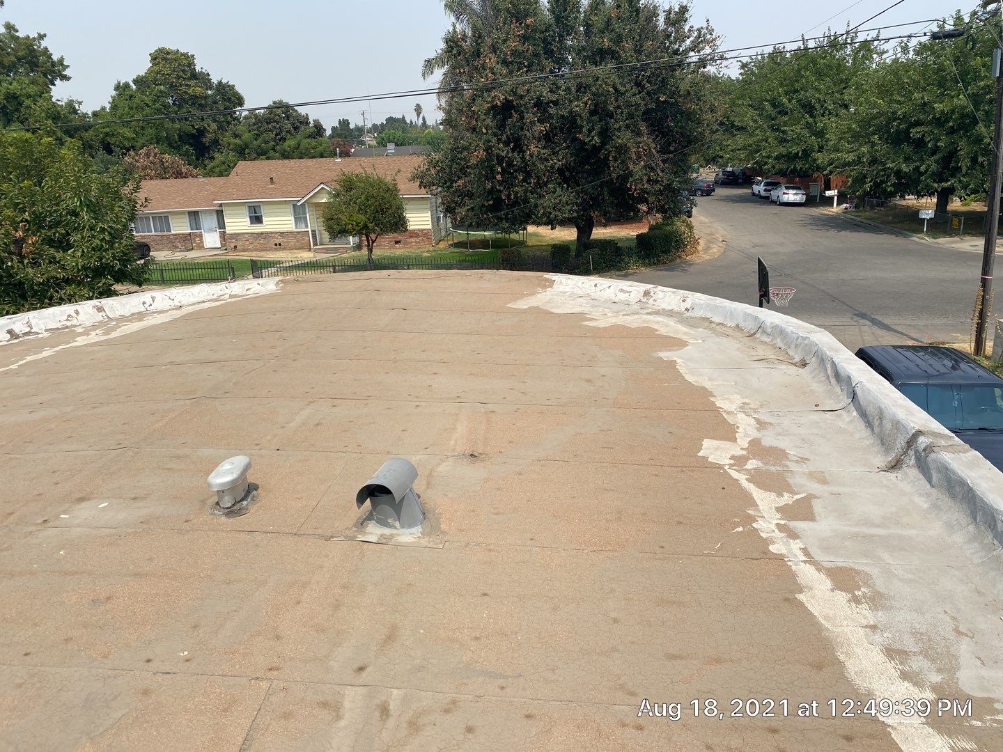 Residential Roofing Installation using Spray foam roofing insulation and General Coatings acrylic coatings by Straight Edge Roofing Inc