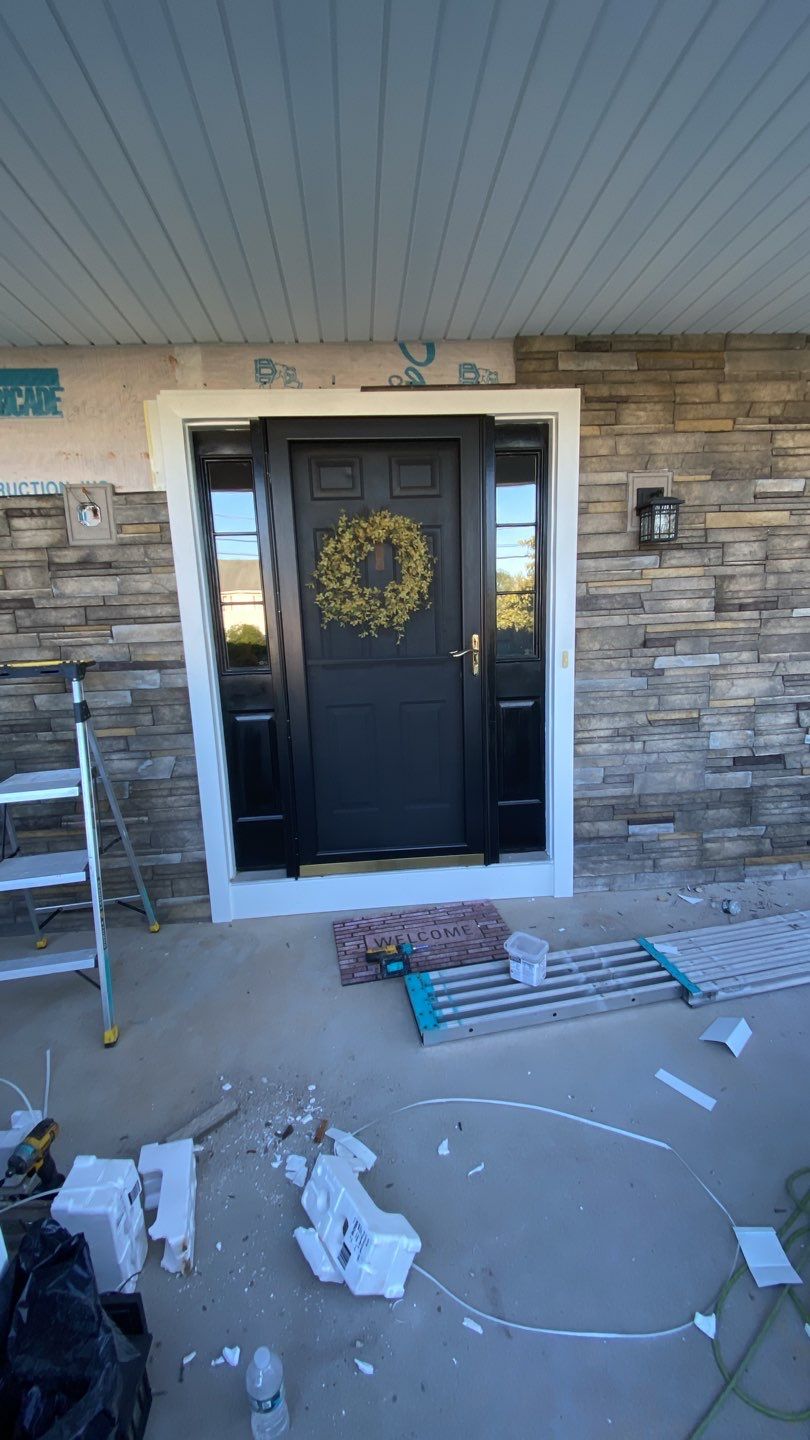 Siding Installation using Certainteed Monogram Charcoal gray and Owens Corning Versetta Stone Sterling by A Plus Exterior