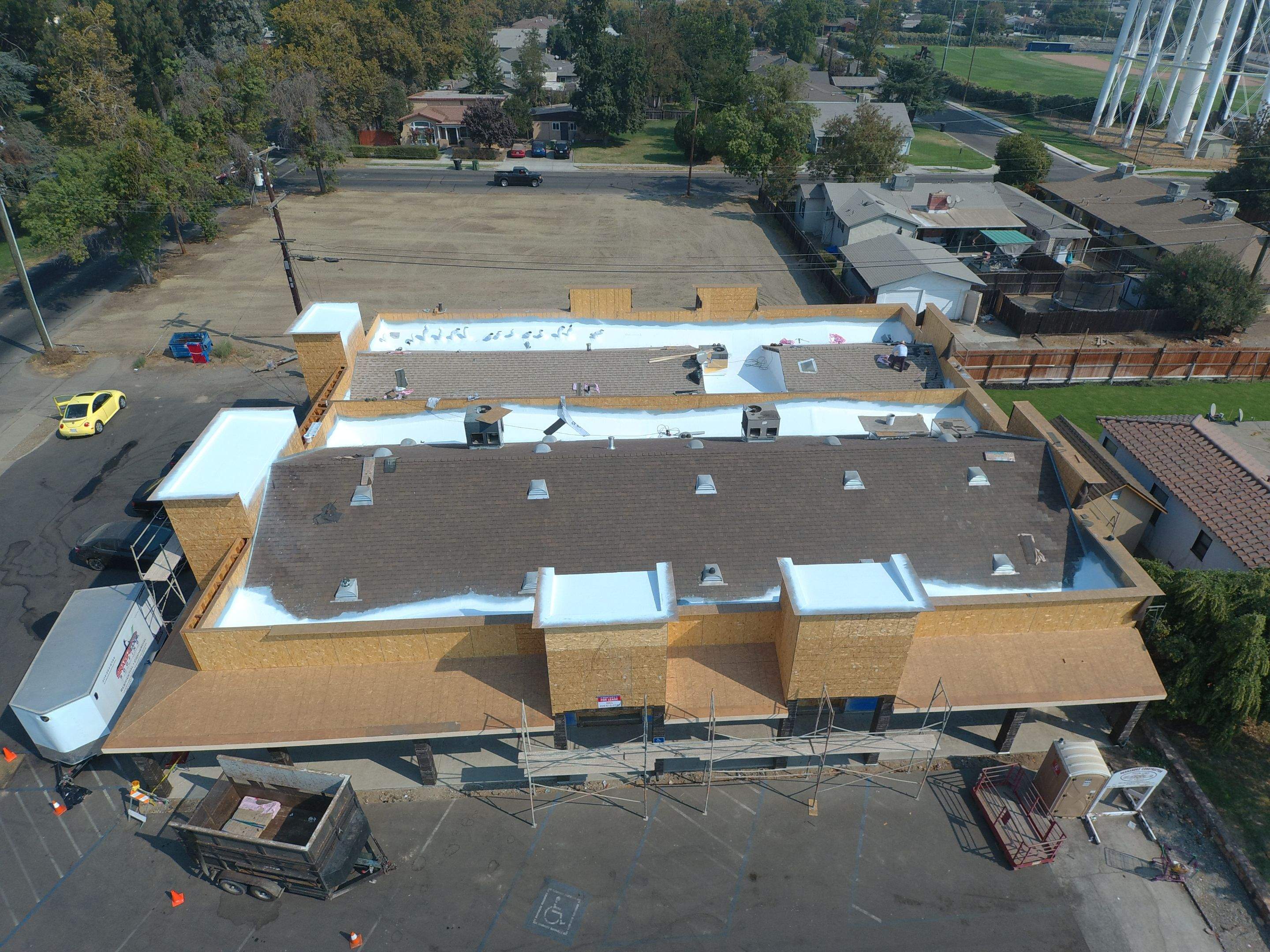 Spray foam and coatings using Conklin Benchmark/PUMA XL coatings and spray foam by Straight Edge Roofing Inc