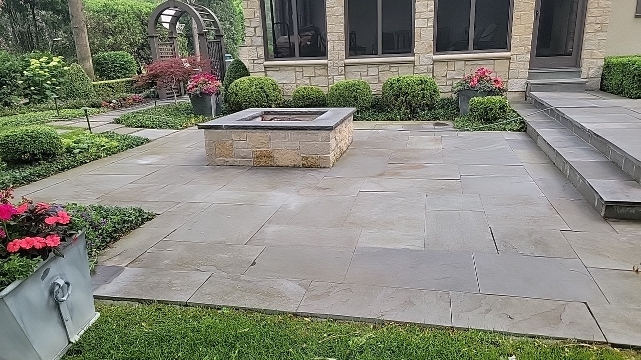 Northbrook, IL stucco home soft wash and stone cleaning by Northern Power Washing LLC.