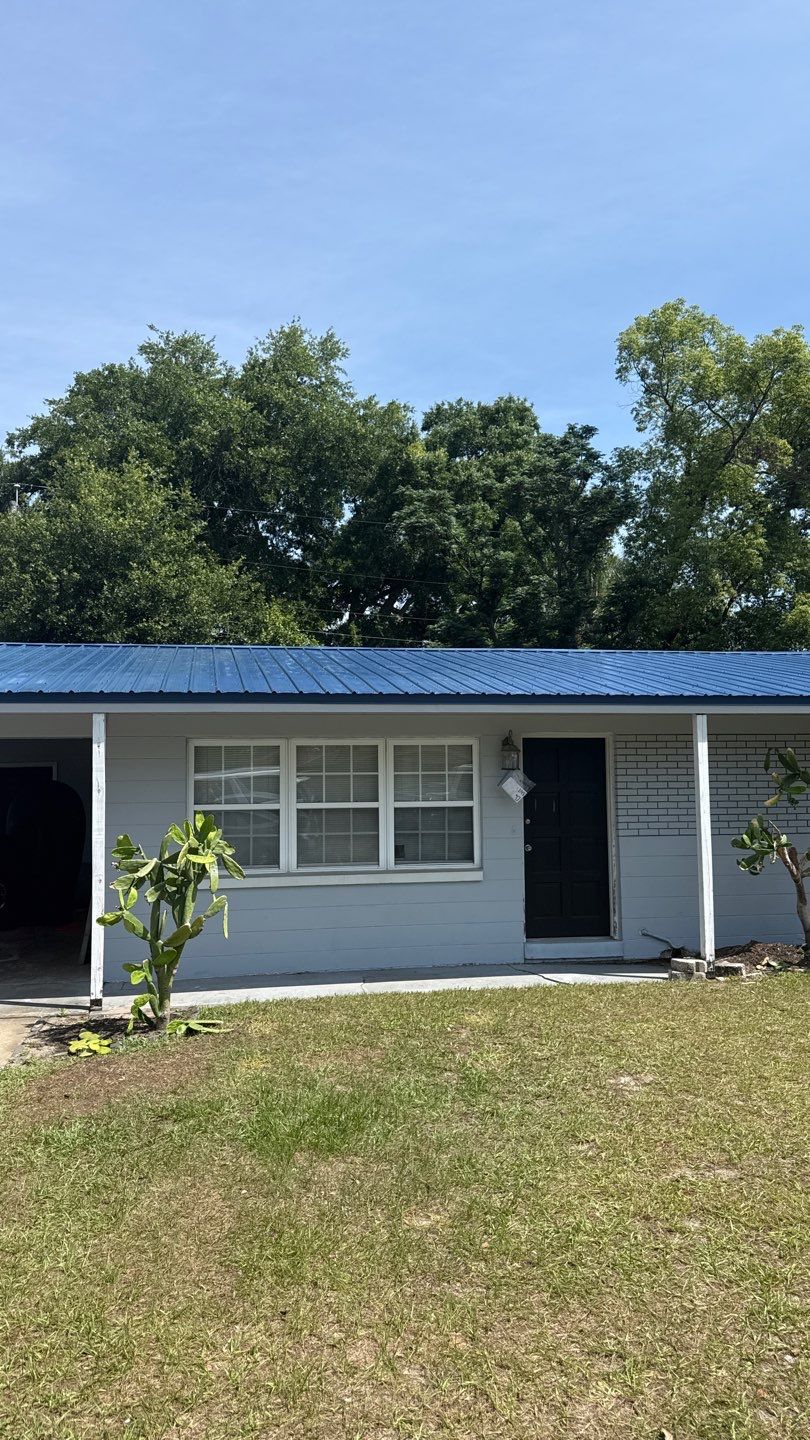 Blue Metal ReRoof and Decking Replacement in Casselberry by Tip Top Roofing Co., Inc.