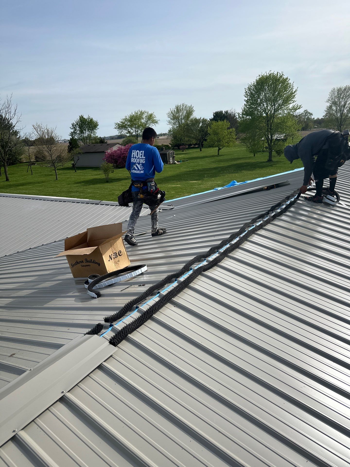 Classic Rib Metal Roofing - Clay by Hoel Roofing & Remodeling