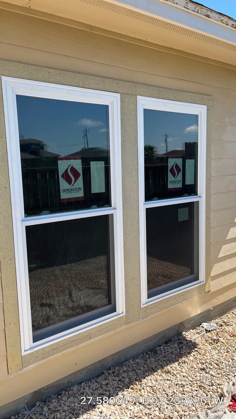 Curved Trim Windows by Bayfront Roofing and Construction