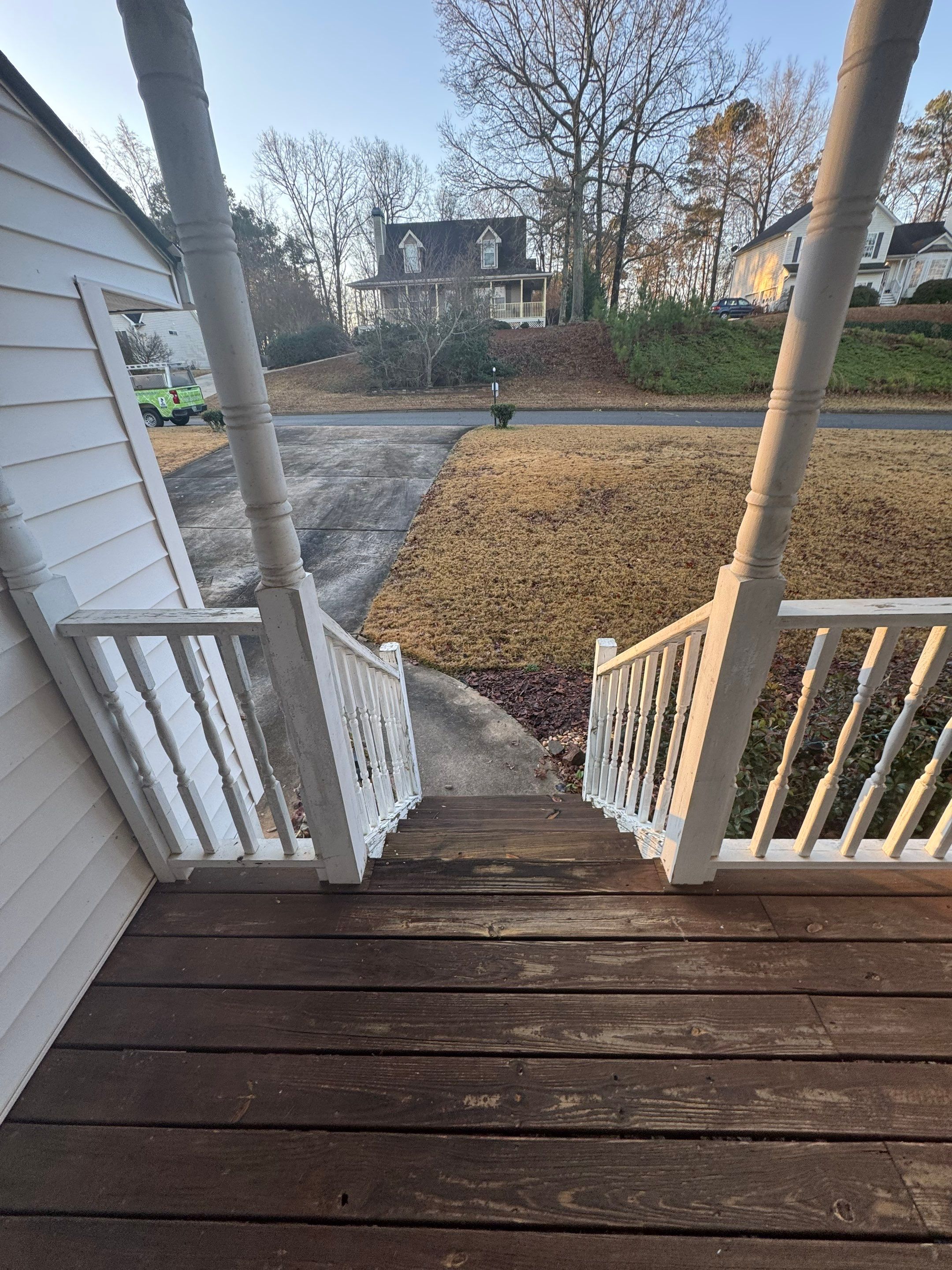 Pressure-Treated Porch Railing and Staircase Upgrade in Cumming by Swift Home Renovations