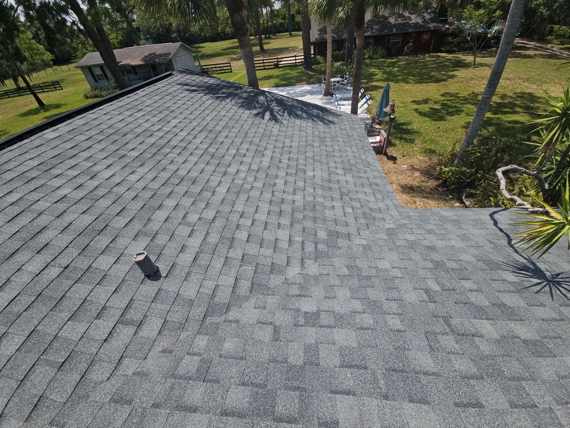 Roof Replacement with Architectural Shingles and Chimney Repair in Cocoa by Wiedmann Construction & Roofing
