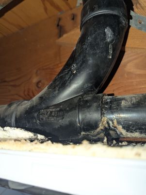 Drain line leak in garage ceiling