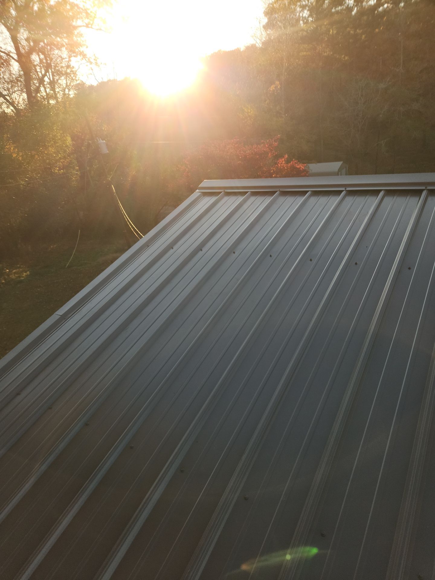 Roof Replacement in Pinson (Metal Roof) by The Roofing Dudes