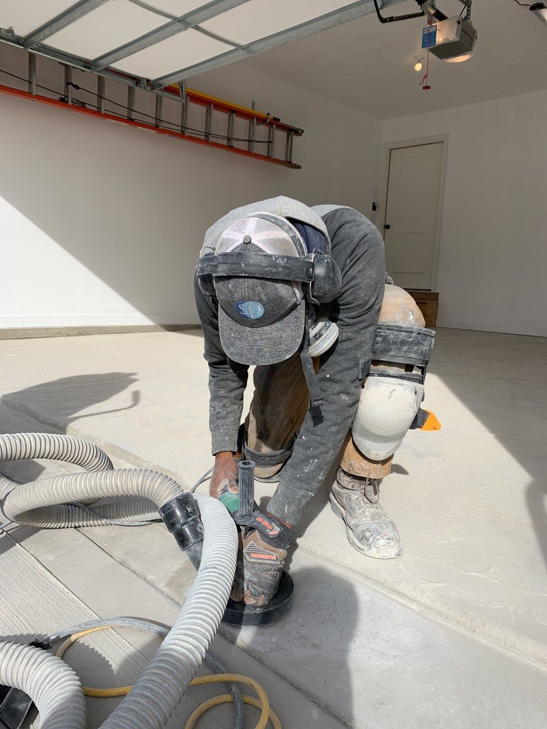 Garage using Domino  by Select Painting, Coatings & Garage Cabinets