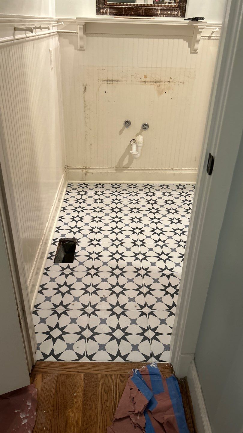 Tile shower and floor by Footprints Floors of Nashville