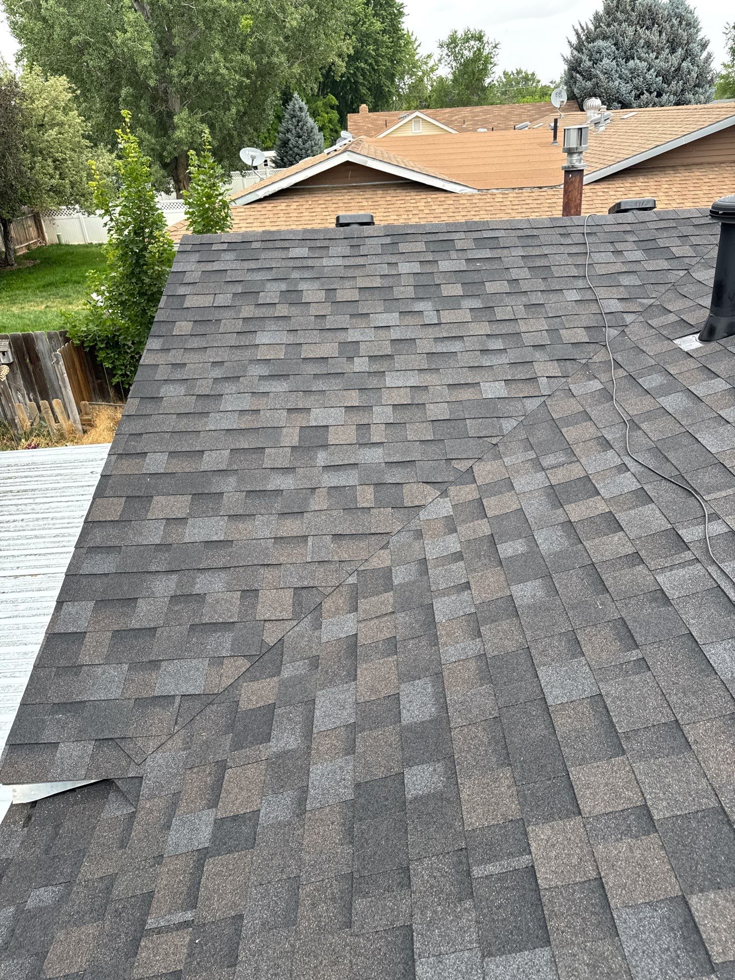 Residential Roof Replacement With Dark Gray Architectural Shingles in Mountain Home by Olive Roofing