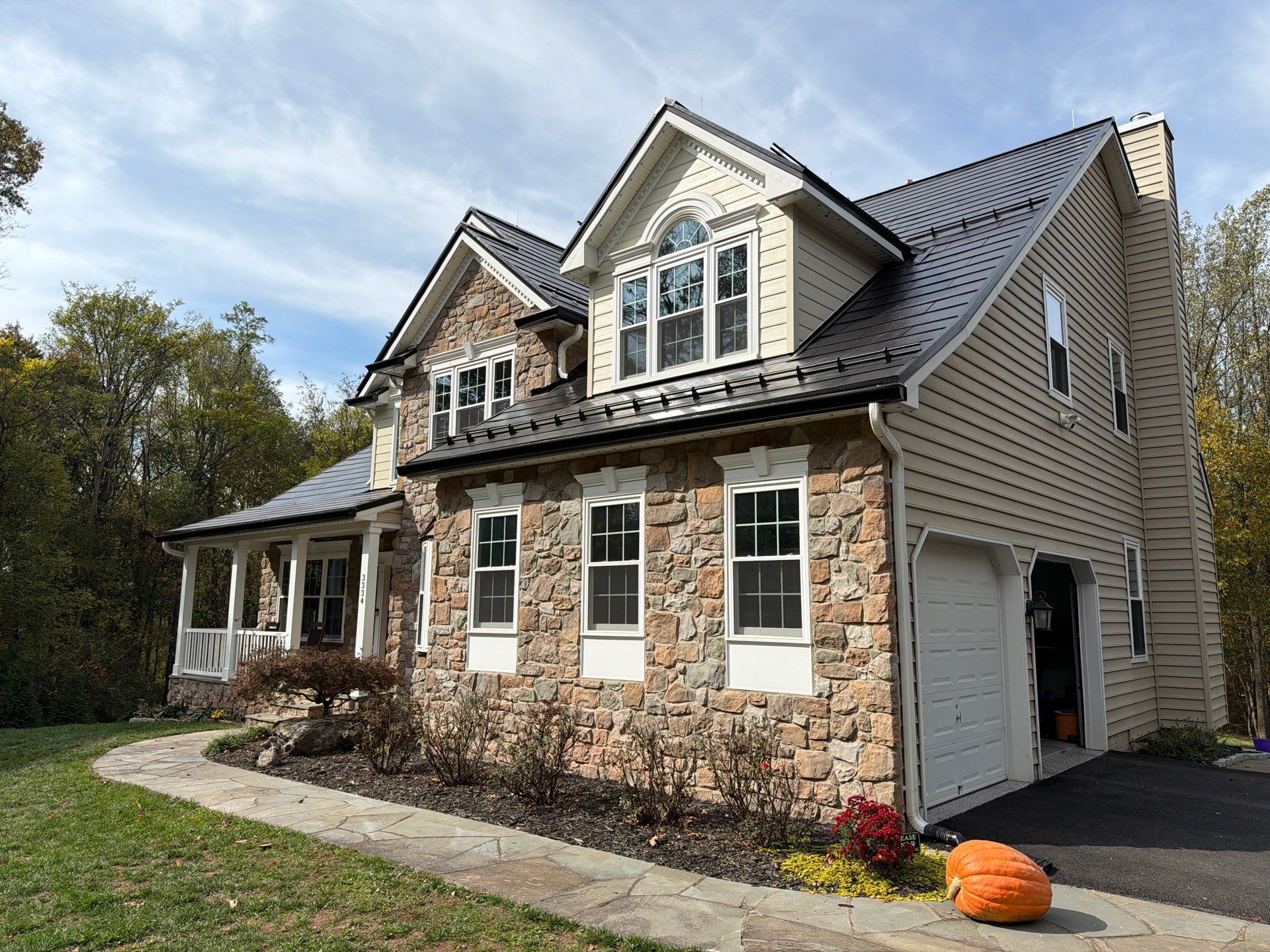 Beautiful James Hardie Siding & Tesla Solar Roof by American Home Contractors