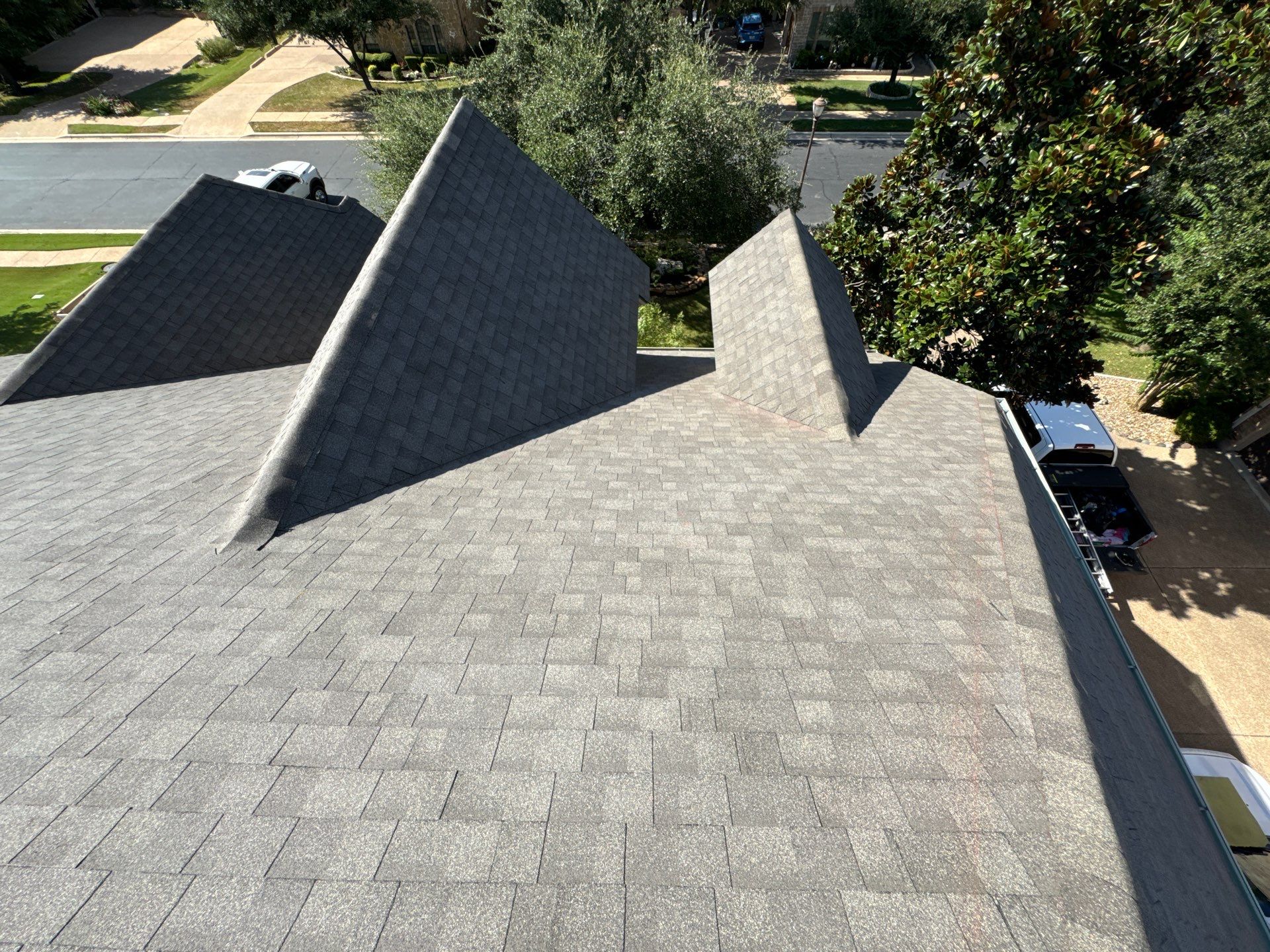 Residential Roofing Installation using IKO, Cambridge in Weathered Wood by Oakwood Roofing and Construction, LLC