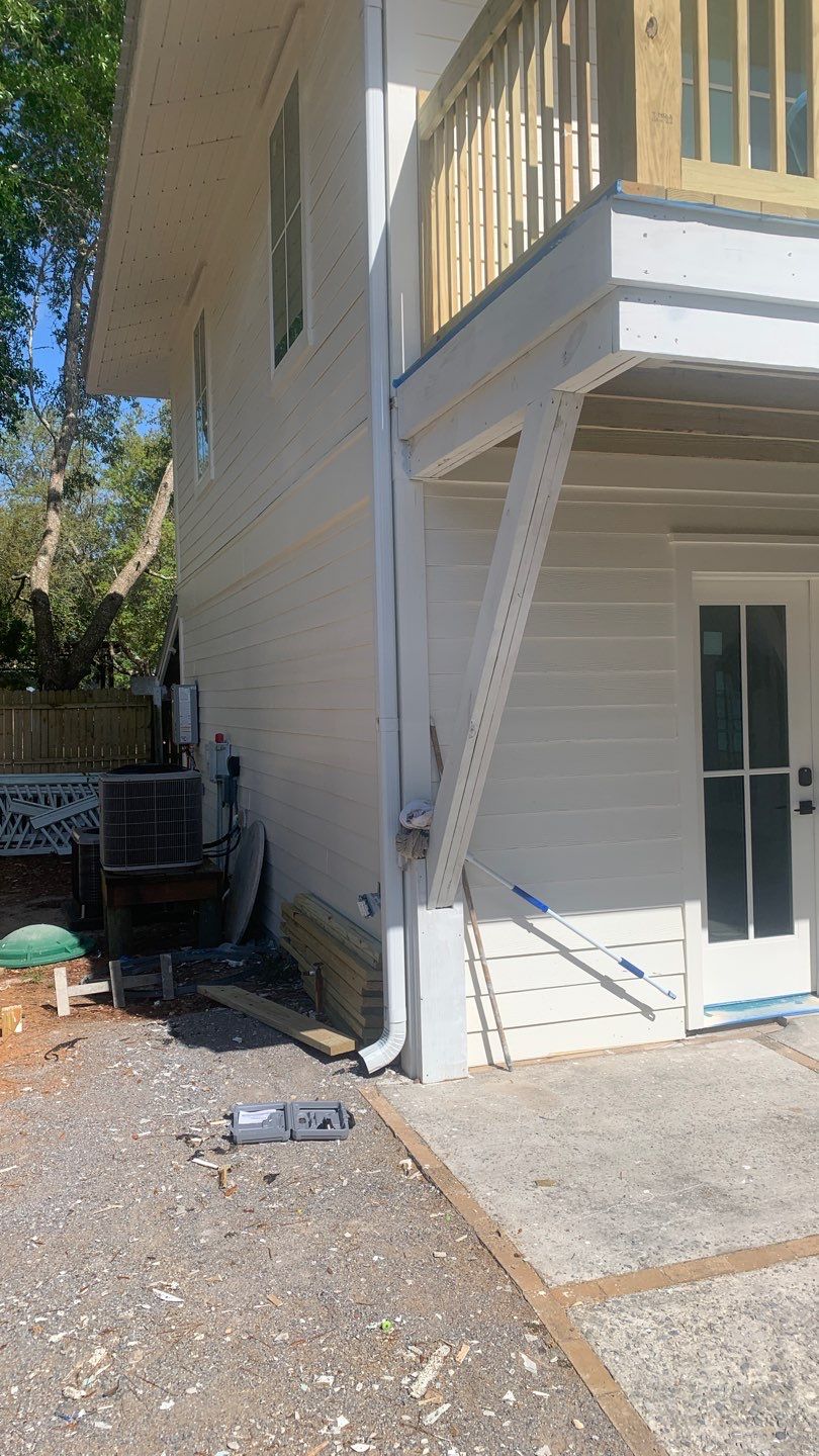 Seamless Gutter Installation Using White K-Style Aluminum Gutters by Gutter Professors