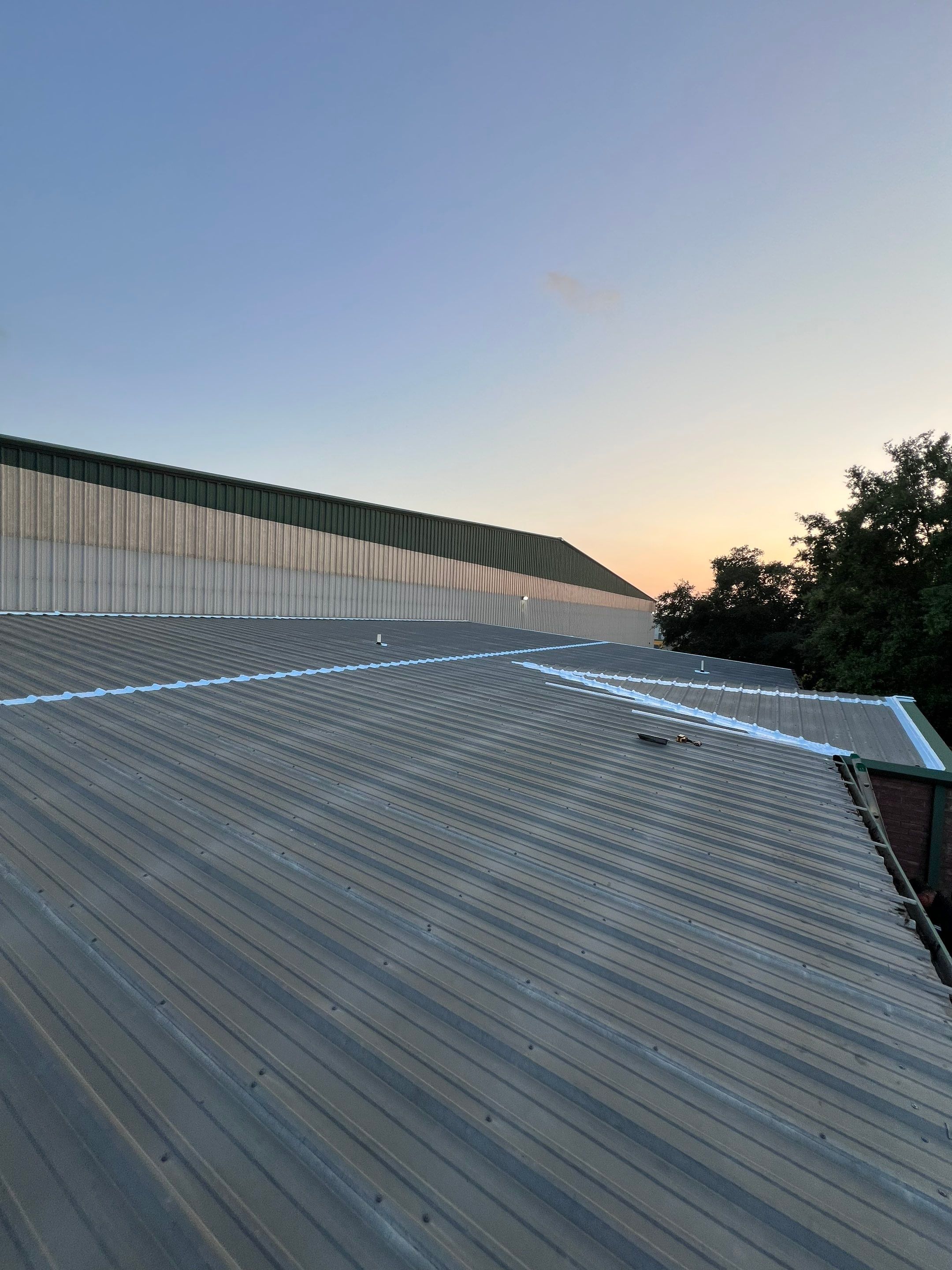 Hail Damage using Metal by Roof Repair Company