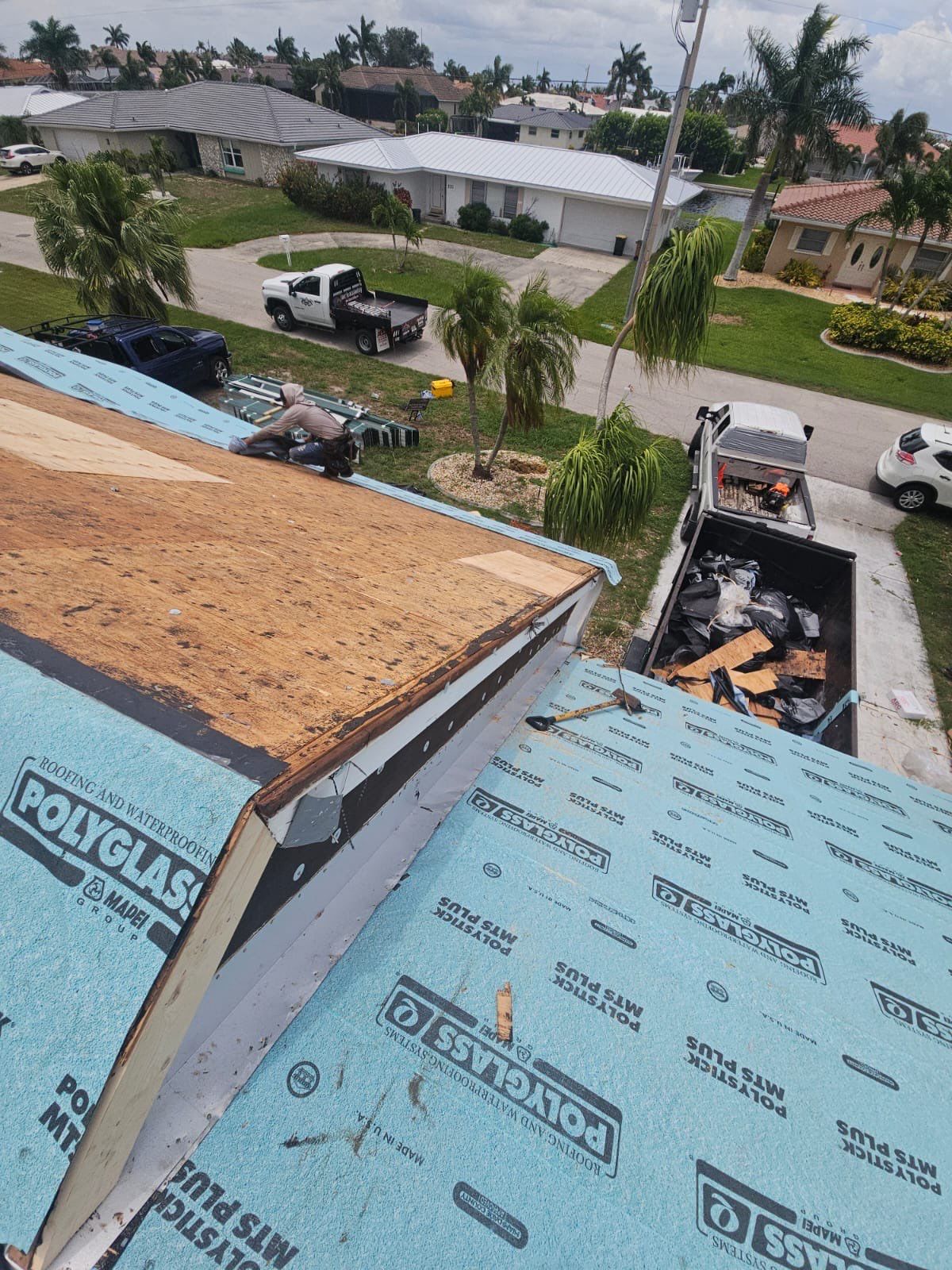 Residential Roofing Installation using Gulf Coast Metals Gulf Seam Panels by Four Peaks Roofing