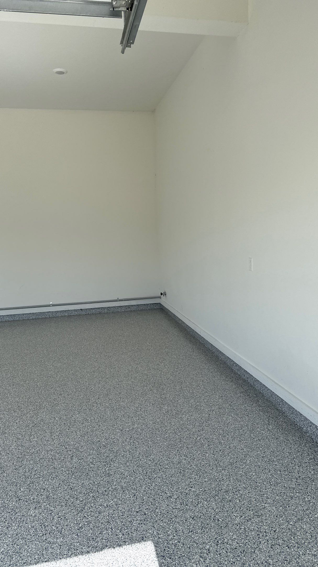 Garage Remodel with Custom Cabinets and Epoxy Floors in Overland Park by Banner Garage
