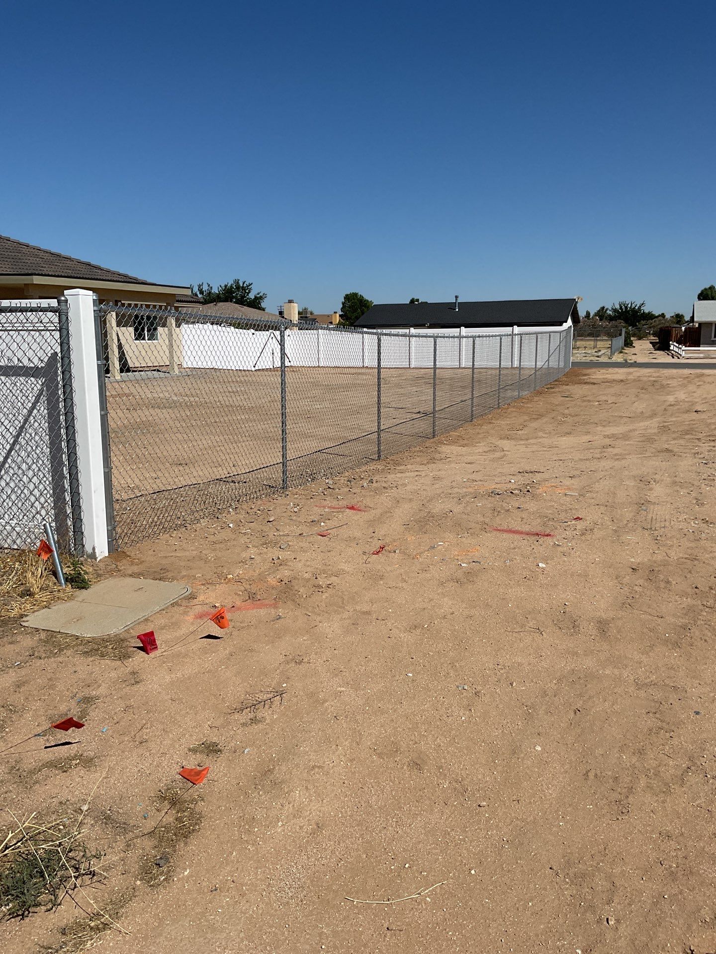 6ft White Privacy Vinyl Fence with Chain-link Fence by Fence Guys Inc.