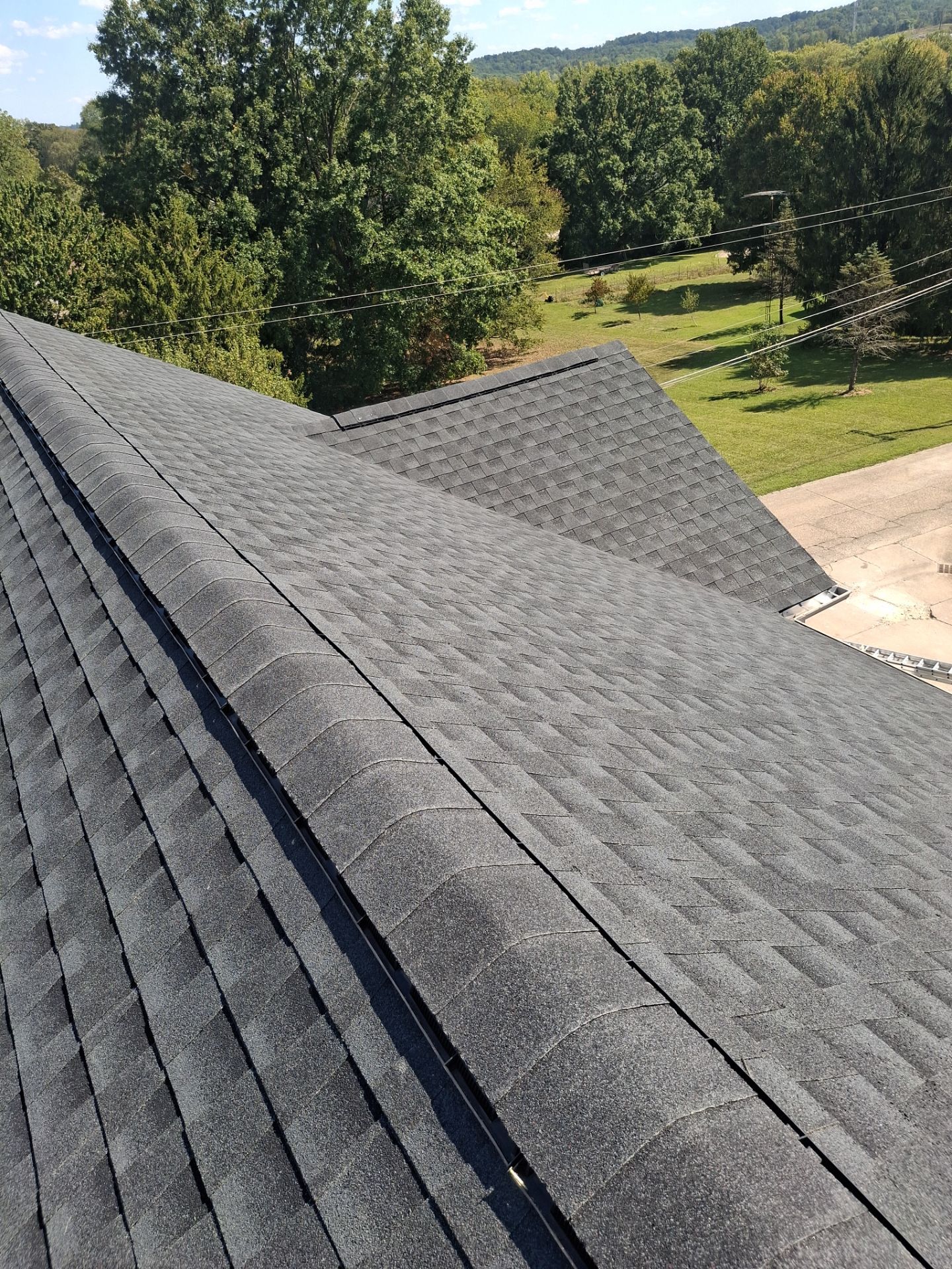 Residential Roofing Installation using GAF Timberline HDZ Charcoal by Rainstoppers Roofing