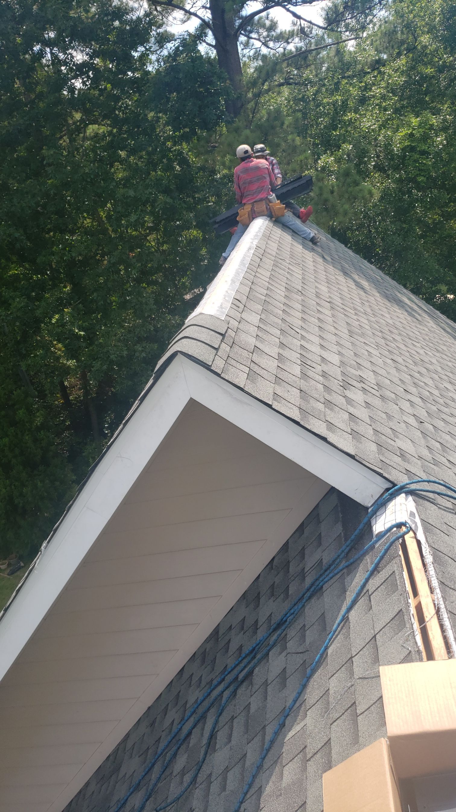 Residential Roofing Installation using Roof Replacement by American Roofing & Construction LLC