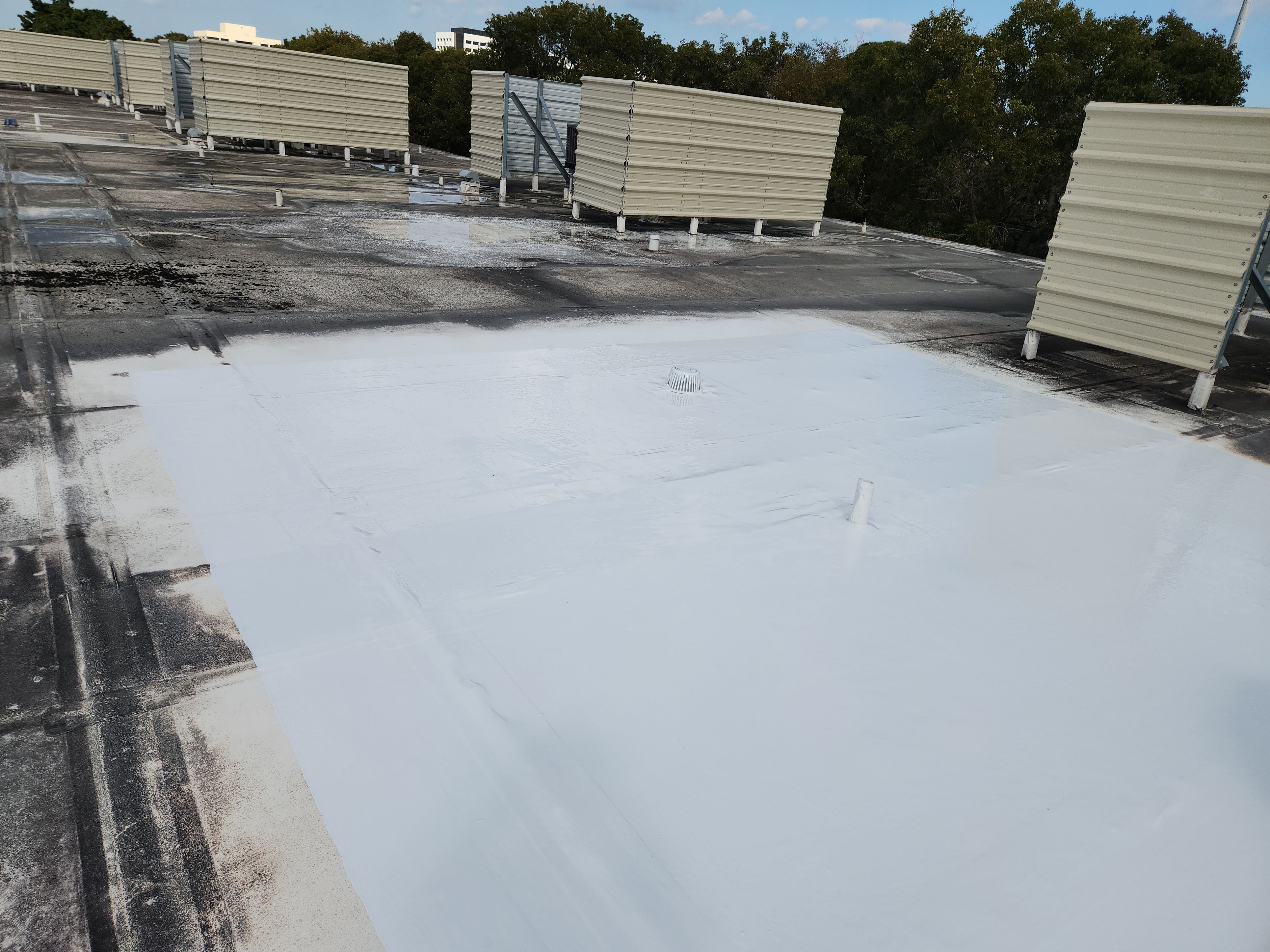 Reflective Silicone Roof Coating and Maintenance in Palm Beach Gardens by Aastro Roofing