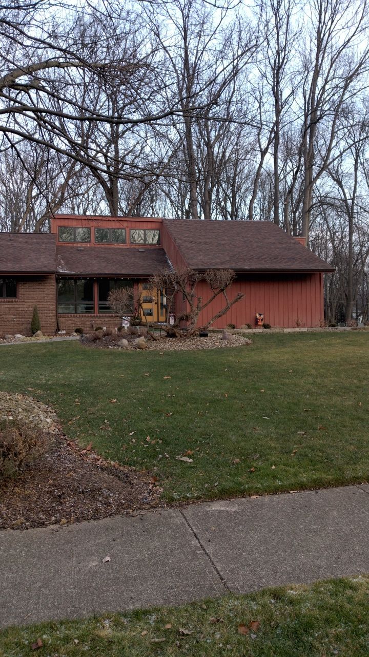 Residential Roof Replacement by Absolute Roofing and Construction