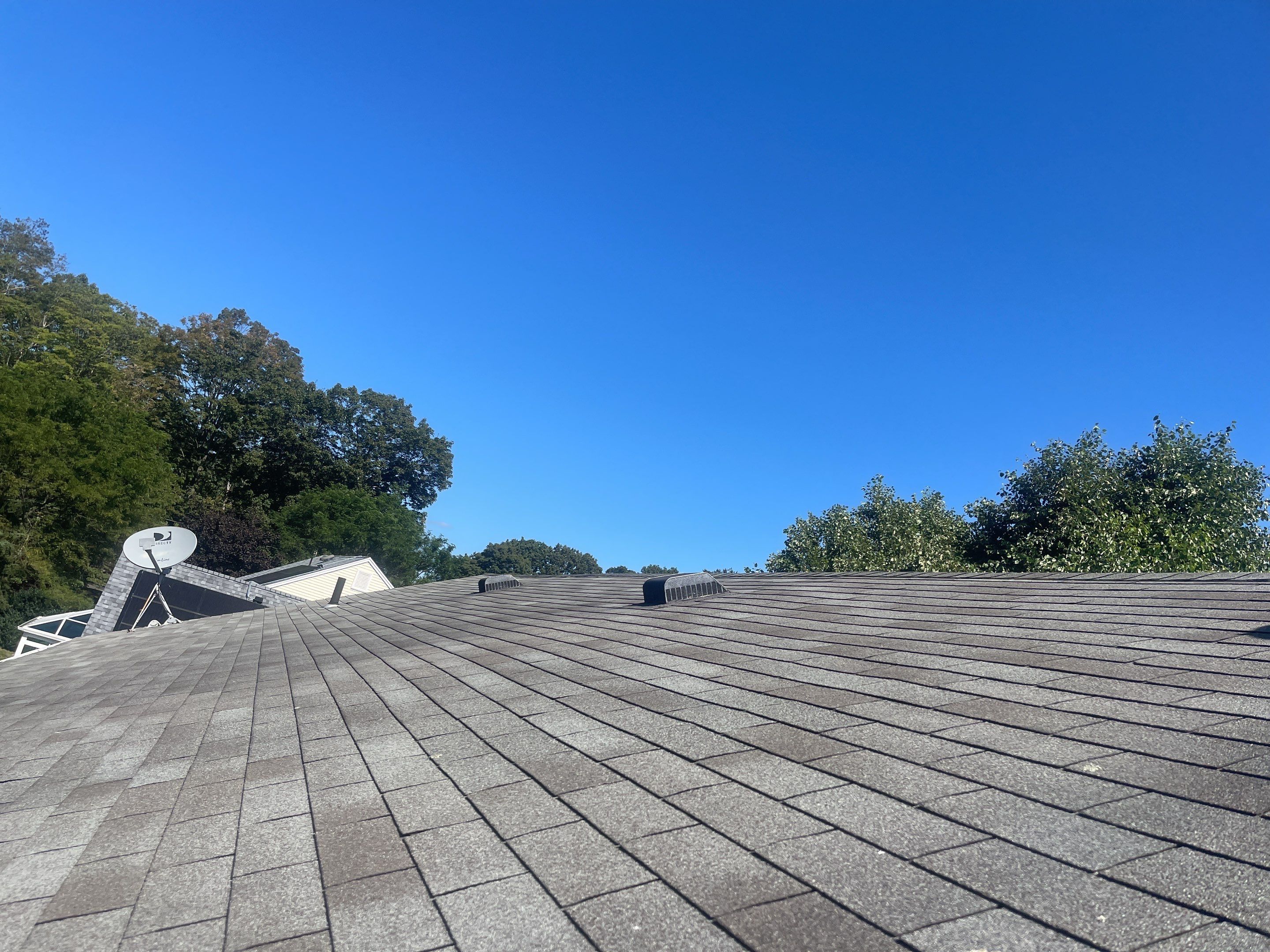 Residential Roofing Installation using Certainteed Landmark Moire Black by A Plus Exterior