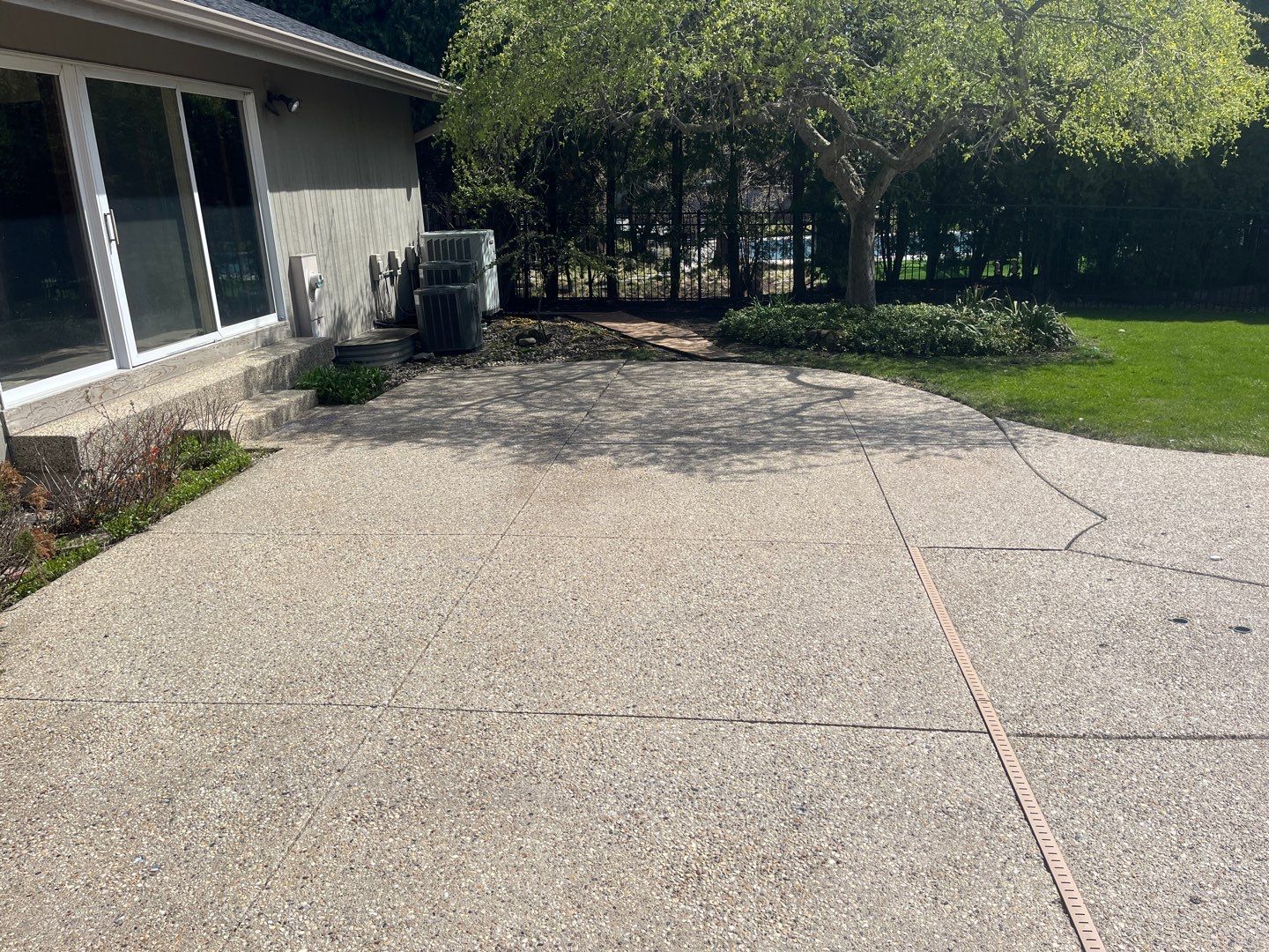 Aggregate Clean and seal using low gloss sealer by Northern Power Washing LLC.