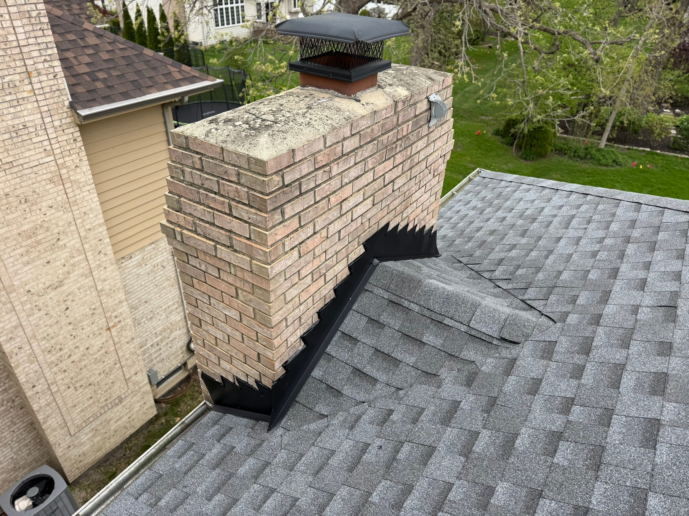 Roof, gutters and chimney flashing by Optimal Home Improvement 